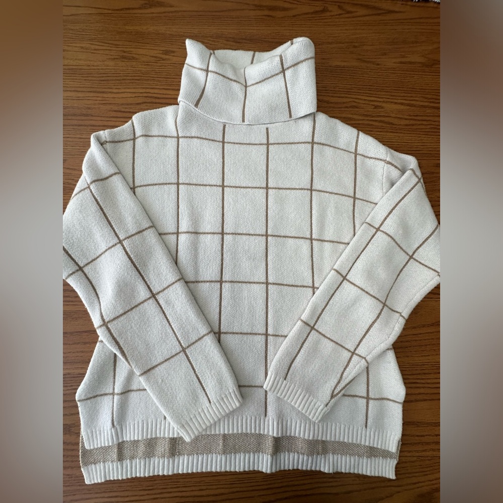 Cream turtleneck sweater with tan small stripes size medium